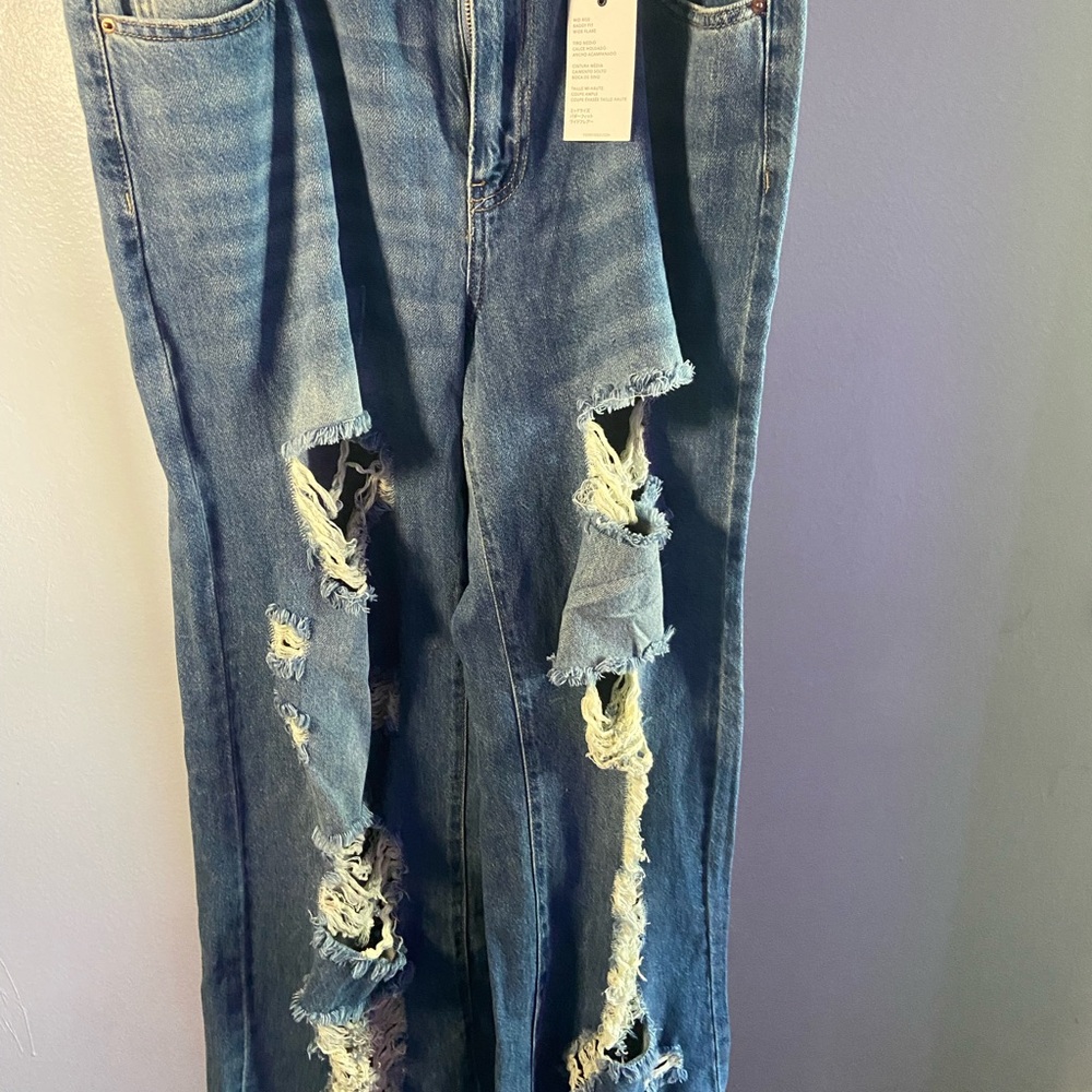 Distressed Blue Jeans
